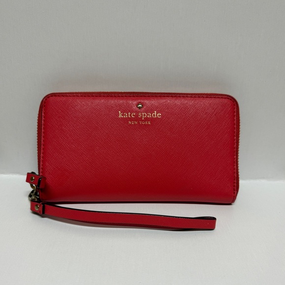 kate spade Handbags - Kate Spade Vibrant Red Zip-Around Wallet